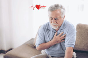 Male holding heart - mild heart attackthe 4 phases of cardiac rehabilitation