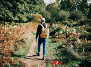 Male walking in a park - walk a mile